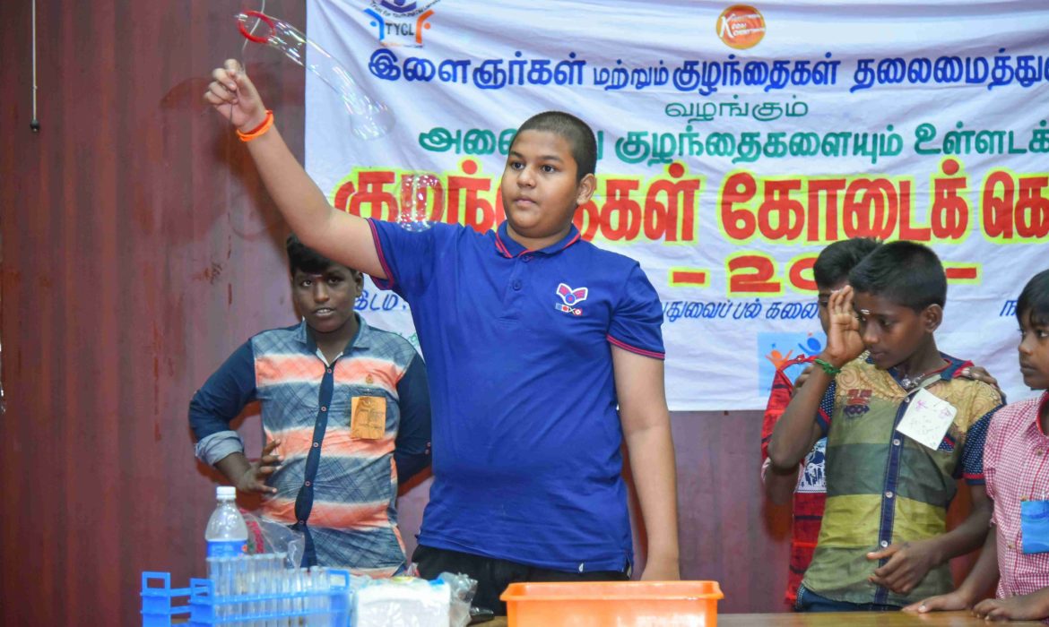 kids doing science experiments at inclusive summer camp by Tycl in pondicherry