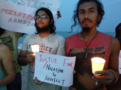 candle light vigil on serenity beach for victims of mob lynching in assam