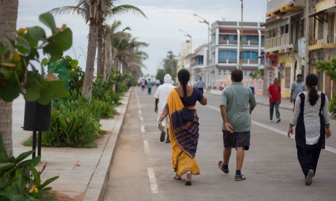 morning walkers exercising on the promenade beach in pondicherry