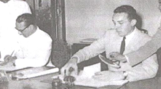 PIERRE LANDRY AND KEWAL SINGH SIGNING THE TREATY OF CESSION WHICH MARKED THE DE FACTO TRANSFER OF PONDICHERRY FROM FRANCE TO INDIA